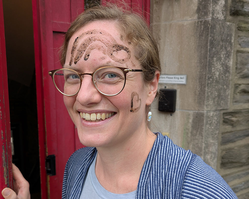 Mud Day 2025 - Teacher face painted.