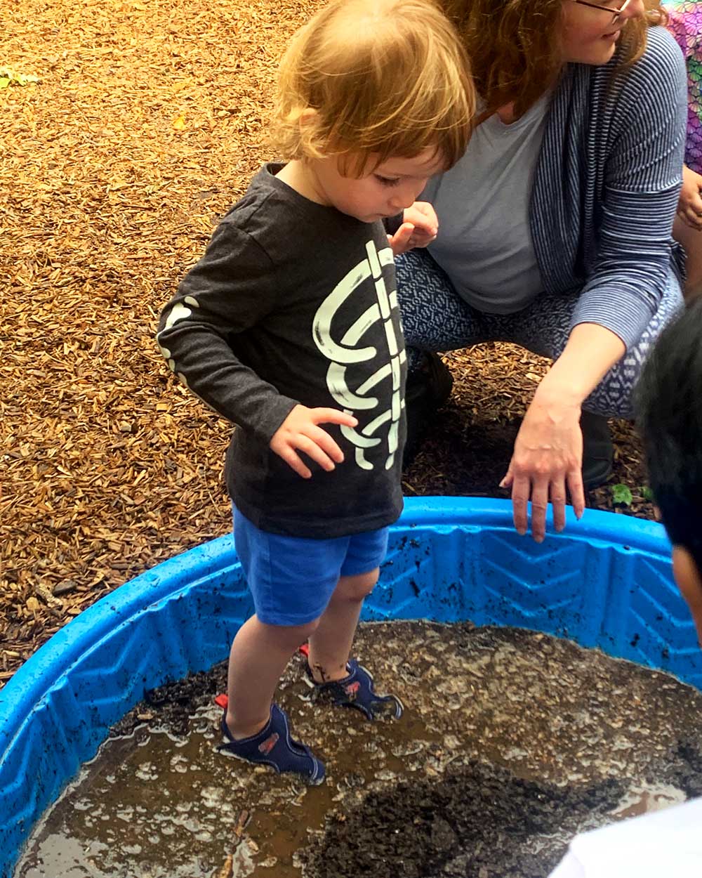 Mud Day 2025 - Squishing in muddy pool.