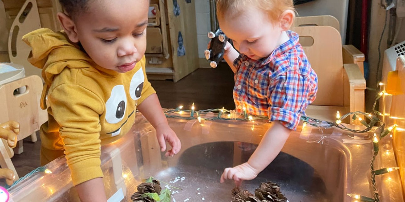 Young toddlers at sensory table