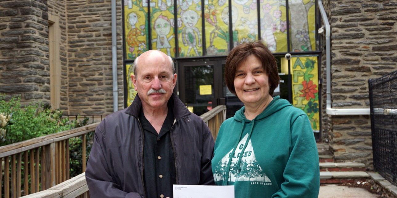 Jim Lily presents check to Deb Green