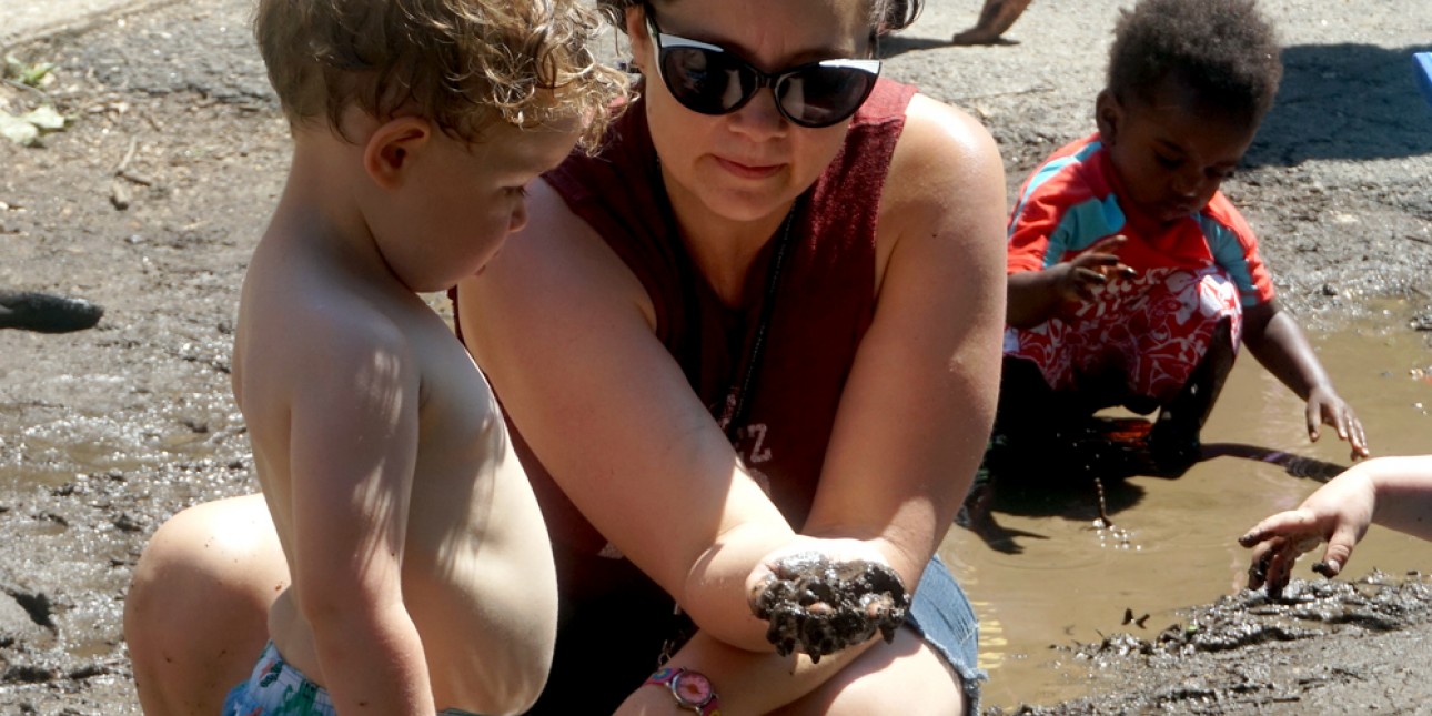 PIC teacher and child on Mud Day 2016
