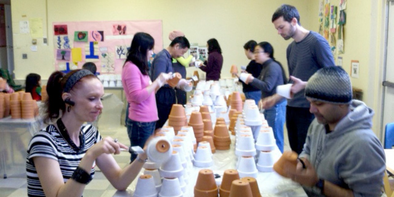 PIC Volunteers Prime KidPots for the PIC Plant Sale