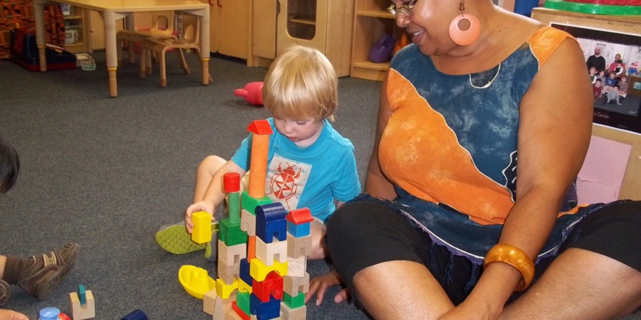 Rainbow teacher and child