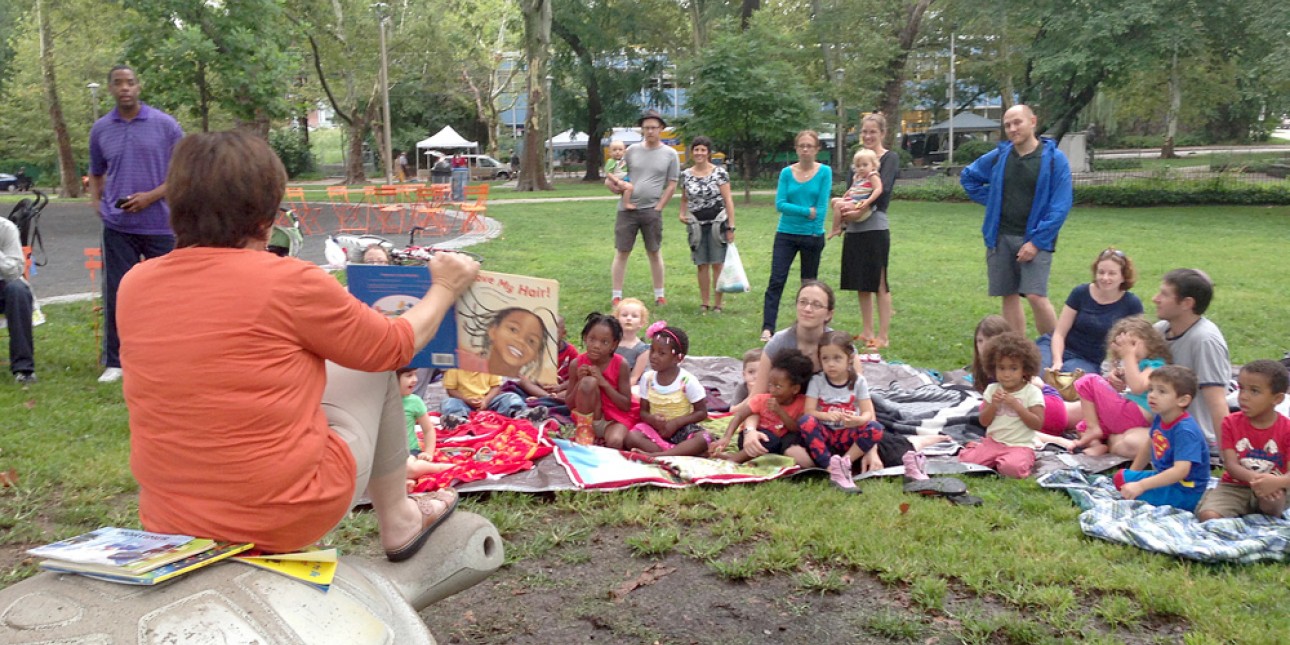 Deb Green reads at Storytime in Clark Park