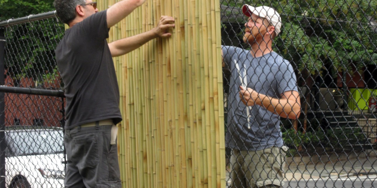 PIC parents install bamboo fence