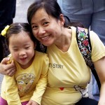 Preschooler and mom at a family social event