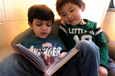 Preschoolers reading together
